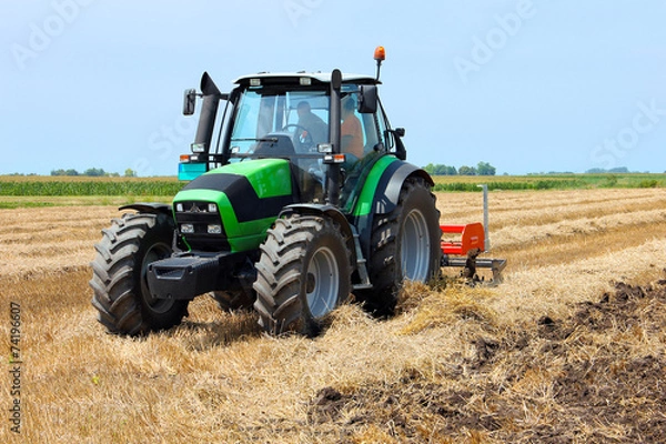 Obraz Tractor on the farmland