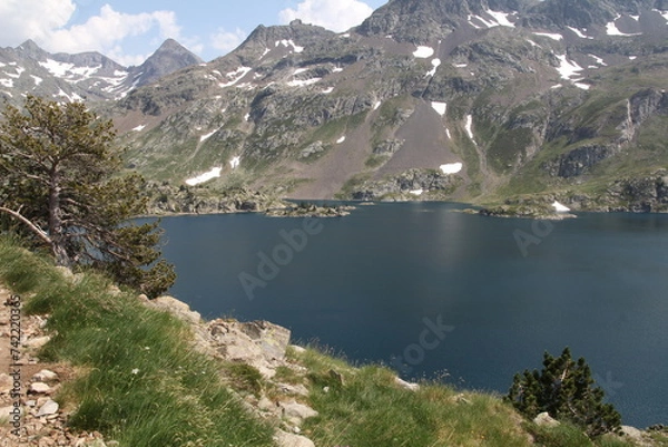 Obraz A majestic lake nestled amongst towering mountains