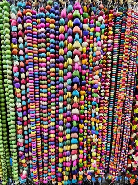 Obraz colorful beads hanging next to each other