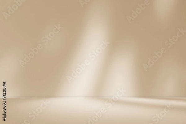 Fototapeta Empty brown cream beige room studio with shadow of leaves for product presentation. Autumn background. Summer tropical backdrop. Cosmetic showroom.