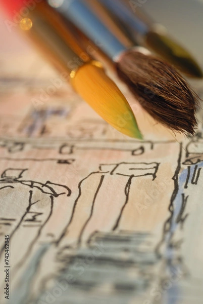 Fototapeta Watercolor brushes on the background of the picture. Shallow depth of field