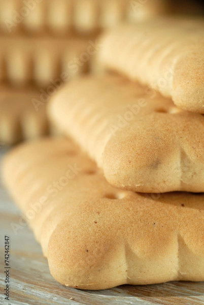 Fototapeta Biscuit cookies on the table closeup. Shallow depth of field