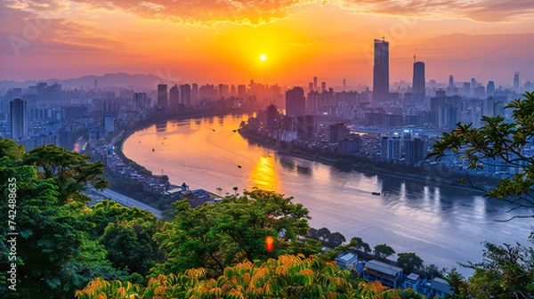 Fototapeta Panoramic cityscape at sunset, showcasing the urban skyline and architectural landmarks in a vibrant, atmospheric setting
