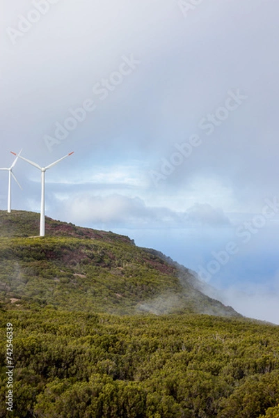 Fototapeta Wind turbines on a cliff.
