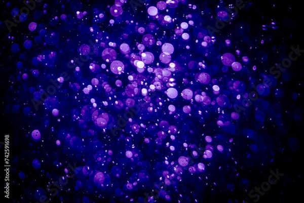 Obraz Blurred photo with purple violet and blue dots visible glittering, shining brightly look and feel luxurious