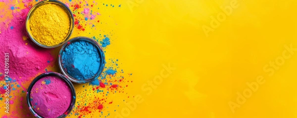 Obraz Holi background. Bowls of colorful gulal powder on yellow table flat lay with copy space. Festive Indian happy holidays greeting card, invitation or banner. Hindu festival of colours 8k backdrop.