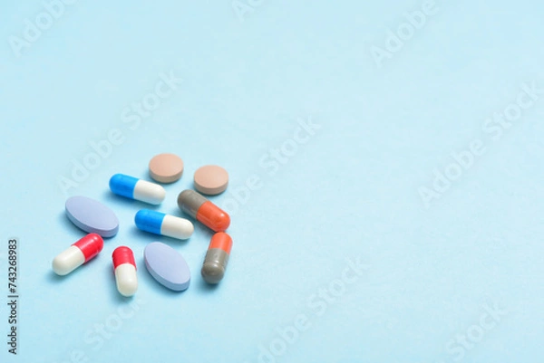 Obraz Tablets on a blue background