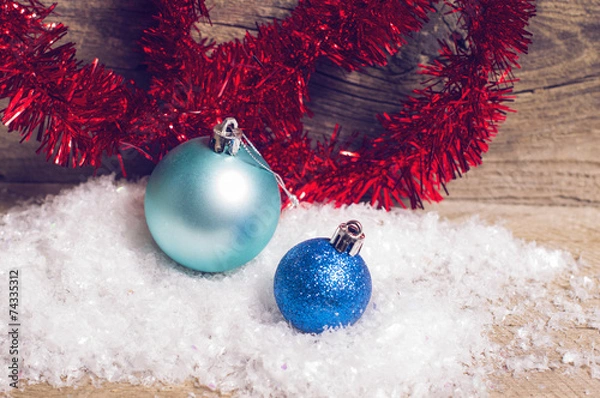 Obraz Blue christmas baubles red tinsel