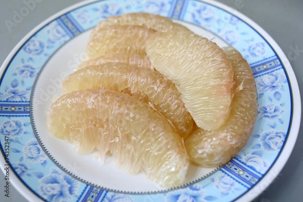 Obraz fresh grapefruit on dish.