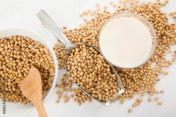 Fototapeta Soy milk in glass with soybeans