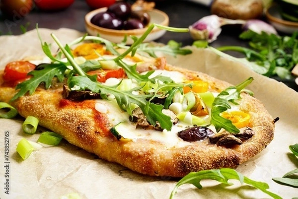 Obraz Homemade vegetarian Pinsa with tomato, olive, arugula and mozzarella