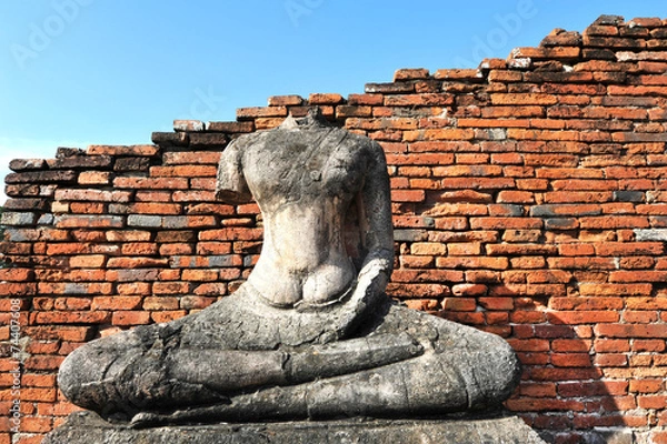 Obraz Buddha and bricks wall