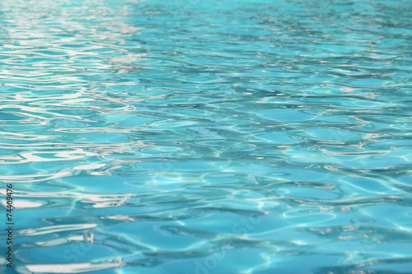 Fototapeta Cyan Swimming Pool water surface background .