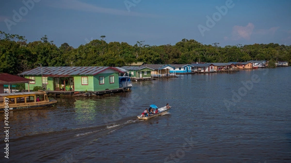 Fototapeta Panoramic aerial view of the Catalão community, made up of floating houses based on the venacular architecture of the peoples of the Brazilian Amazon, near the city of Manaus (AM).
