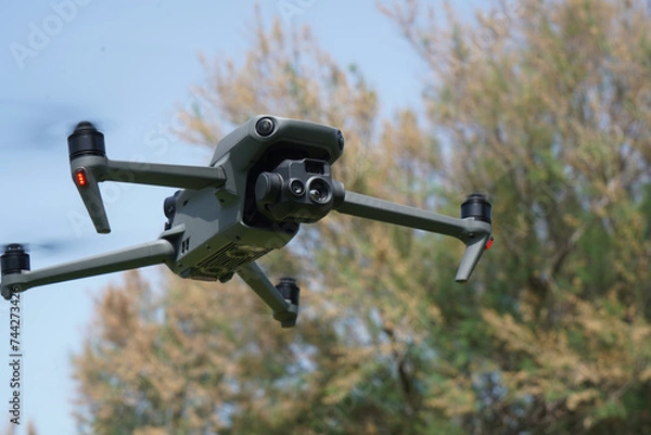 Fototapeta Detailed plan of a high-tech drone with large sensors and multifunctional camera, with powerful zoom and thermal, for rescue and surveillance, horizontal