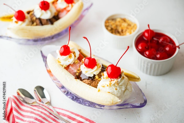 Fototapeta banana split with cherries and nuts