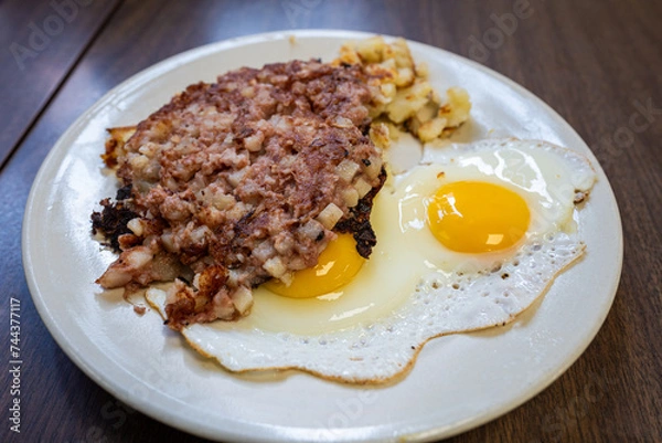 Obraz Corned beef hash with fried eggs