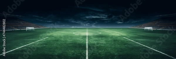 Fototapeta empty soccer field at night with a line,