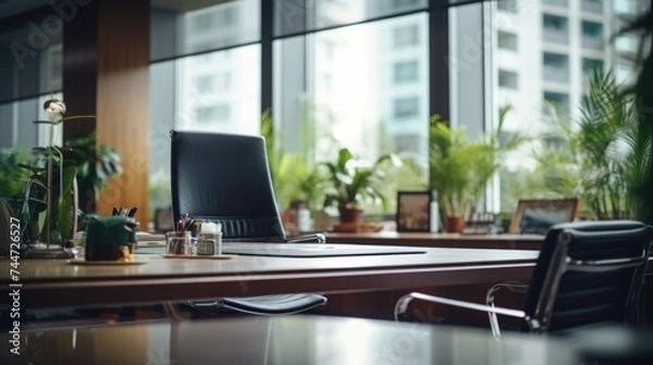Fototapeta Modern laptop computer on a wooden desk, suitable for office and technology concepts