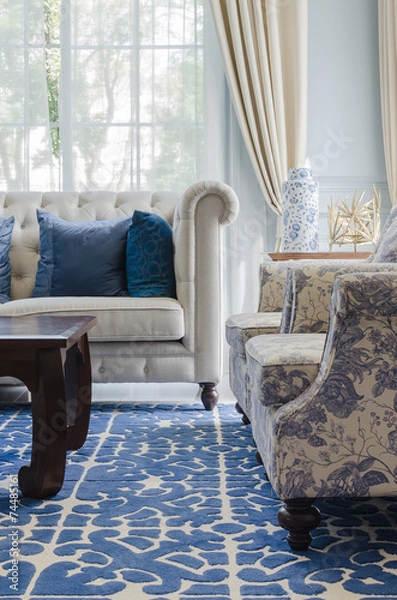 Fototapeta luxury living room with sofa on blue pattern carpet