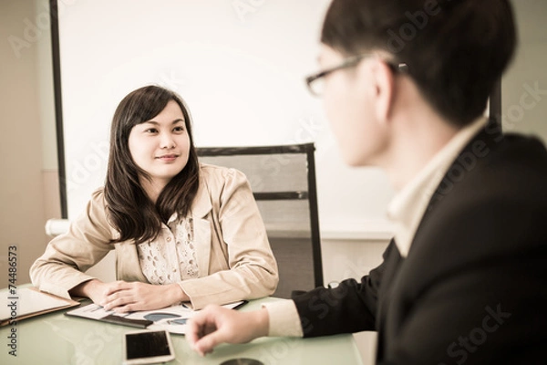 Obraz Successful young business executives meeting at the office