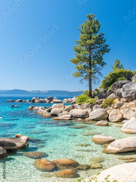 Obraz North Shore of Lake Tahoe Secret Harbor with giant granite boulders in clear blue turquoise water on a bright sunny day 