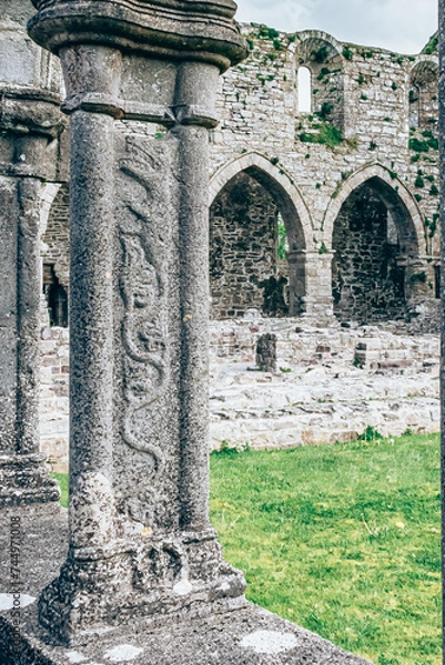 Obraz Jerpoint Abbey tipperary Ireland ancient cloister sculptures unique depicting saints and ornamentation, irregular, worn, and decayed, but restored 