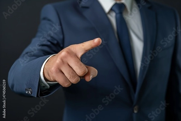 Fototapeta Businessman pointing with finger