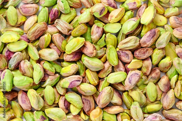 Obraz Peeled pistachio nuts background texture