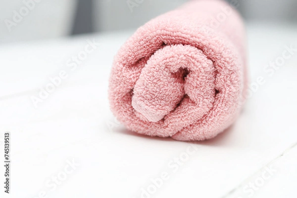 Obraz Pink cotton towel on white background.