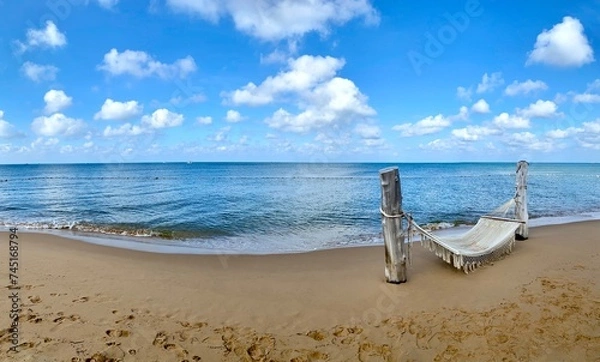 Obraz White macrame hammock at the beach. Panoramic photo.