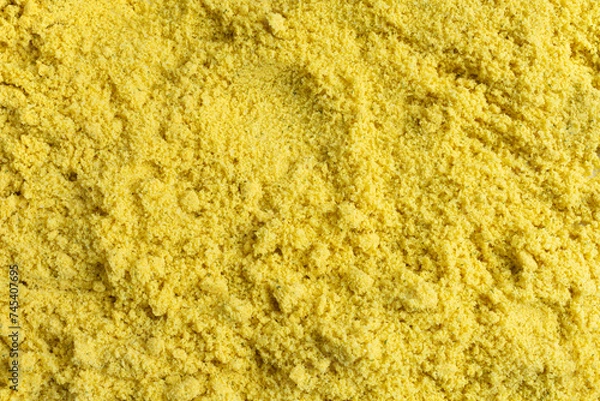 Fototapeta An abstract image of powdered chicken soup stock. 