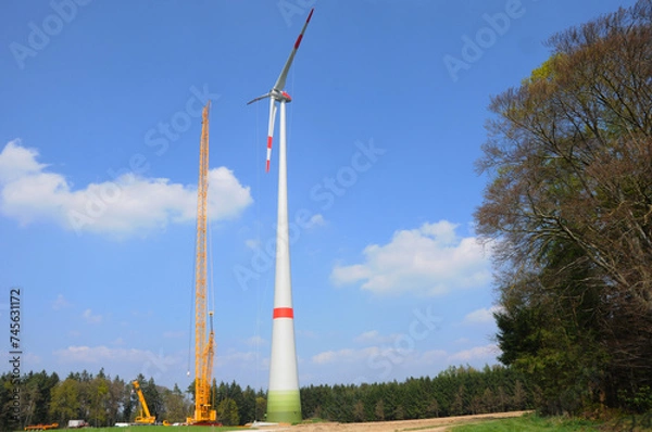 Obraz Windrad, Windradreperatur,Schwerlastkran vor einem Windrad