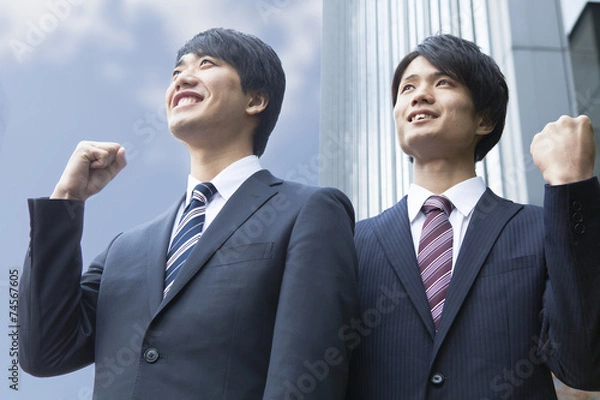 Obraz ガッツポーズをするビジネスマン