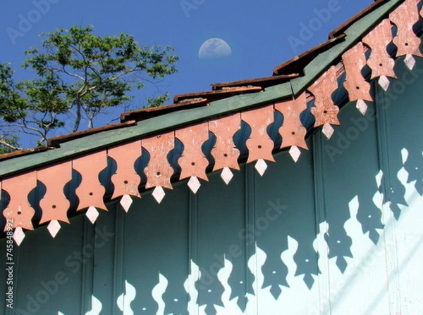 Obraz Moon and the roof an old house