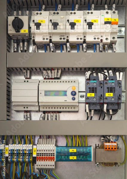 Fototapeta Electrical control cubicle with electrical devices