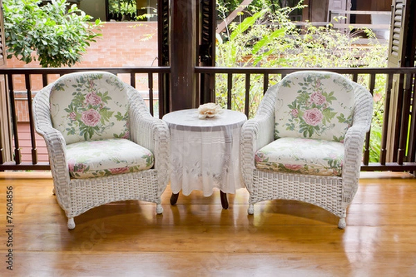 Obraz Outdoor rest area with white nice armchair sofa,