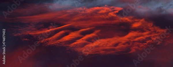 Obraz Dramatic clouds at down