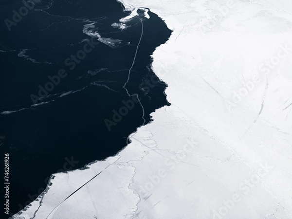 Fototapeta aerial of winter frozen lake with snow in china