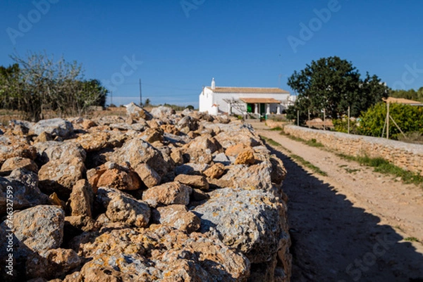 Fototapeta typical house with dry stone wall, Sant Ferran de les Roques, Formentera, Pitiusas Islands, Balearic Community, Spain