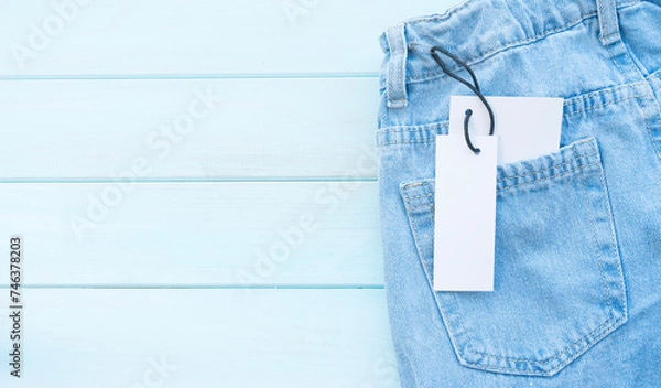 Fototapeta Jeans pocket with attached label