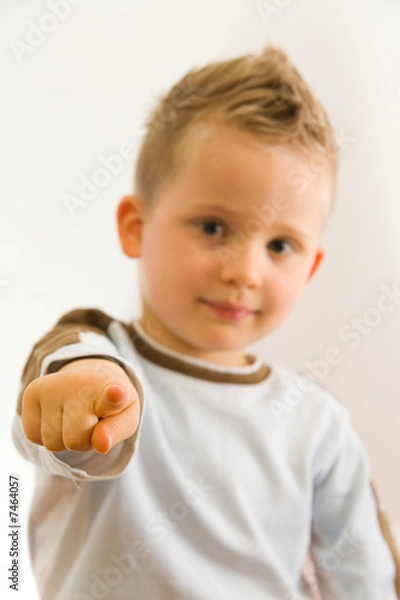 Obraz Child showing on somebody by his finger
