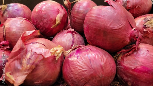 Fototapeta Red onions on the market place 