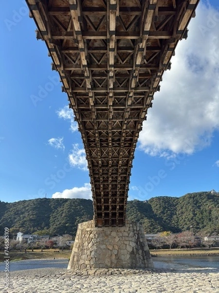 Fototapeta bridge over the river in the mountains