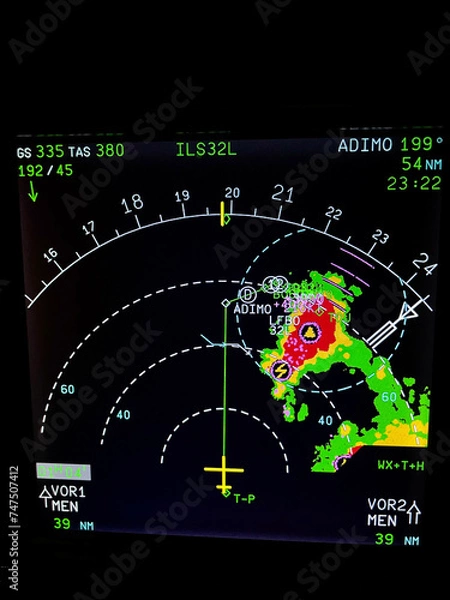 Obraz Navigation display of an airplane during an approach with thunderstorms on radar screen 