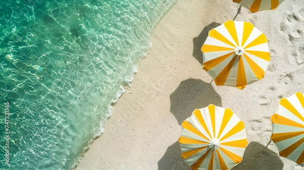 Fototapeta Beautiful summer beach background with parasol and beach
