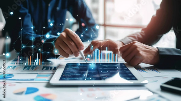 Fototapeta Professionals explore complex data analytics displayed on digital tablet, highlighting modern business strategy and decision-making. Business and latest analysis technologies