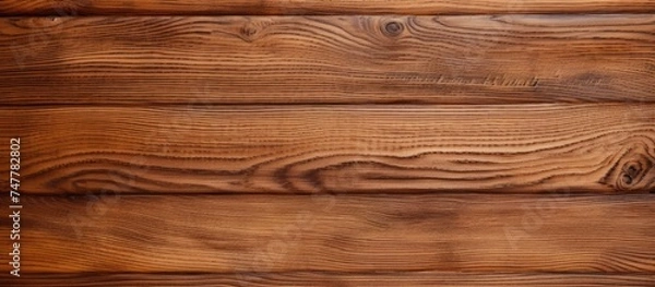 Fototapeta A detailed close-up view of a wooden wall, showcasing the natural texture and grain of the wood. The intricate patterns and rugged surface of the wall are prominently displayed.