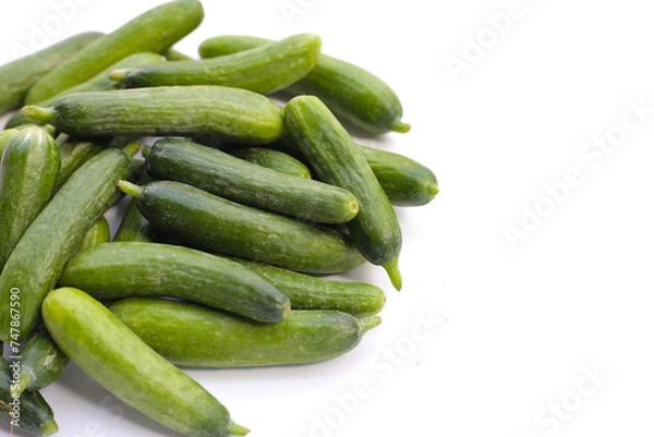 Obraz Mini cucumbers on white background.
