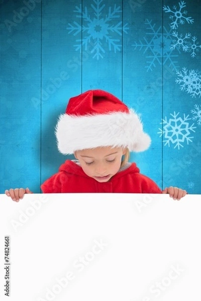 Fototapeta Composite image of festive little girl showing poster